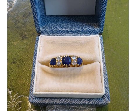 Antique 18ct sapphire and diamond seven stone ring, size K.