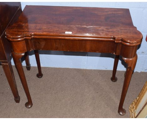 Georgian mahogany fold-top card table of shaped rectangular design, the folding top opening to reveal a baize interior with c