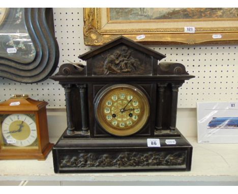A slate mantle clock, by J.W Benson