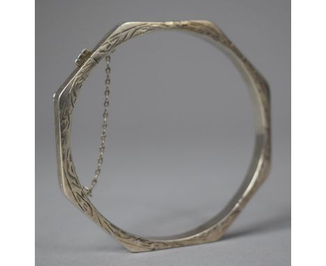 A Vintage Silver Octagonal Bangle with Engraved Decoration 