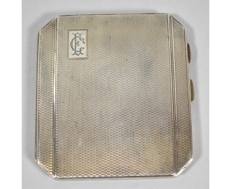 A Silver Cigarette Case with Engine Turned Decoration Monogrammed C E, Birmingham Hallmark 