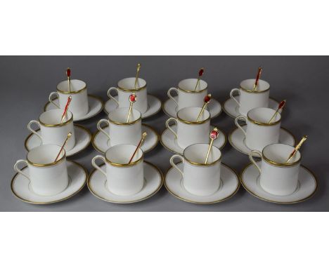 A Royal Worcester Gilt Coffee Set to comprise 12 Coffee Cans, 12 Saucers together with 12 Various Enamelled Stainless Steel C