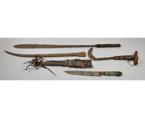 An East African Maasai Seme Sword, Large Decorated West African Nigerian Metal Axe Head and Two Other Tribal Knives 
