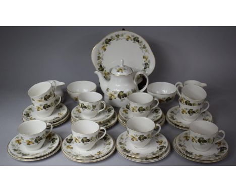 A Royal Doulton Larchmount Teaset to comprise 10 Cups, 11 Various Saucers, 11 Side Plates, 2 Milks, 2 Sugars, Cake Plate and 