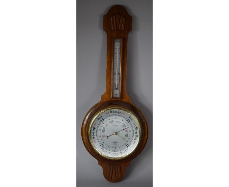 A Modern Android Wheel Barometer with Thermometer, 73cm high 