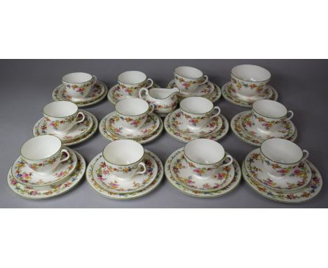 A Coalport Floral Decorated Teaset to comprise 11 Cups, 12 Saucers, 12 Side Plates, Milk, Sugar 