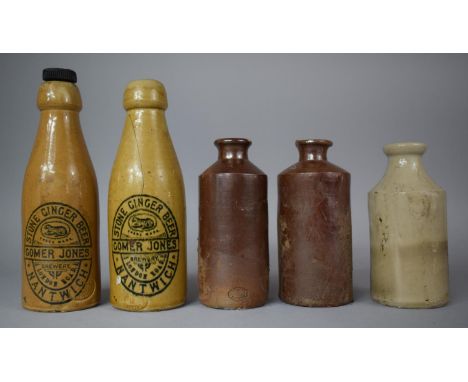 A Collection of Five Vintage Stoneware Bottles Including Gomer Jones, Nantwich for Ginger Beer 
