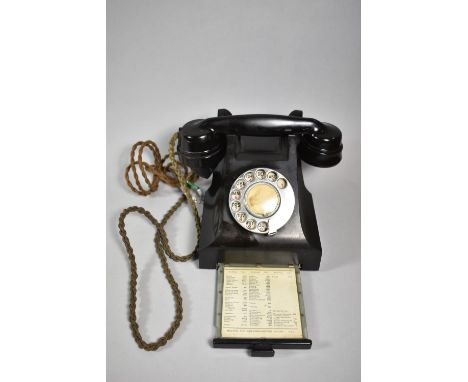 A Vintage Bakelite Telephone with Pull Out Number Drawer 
