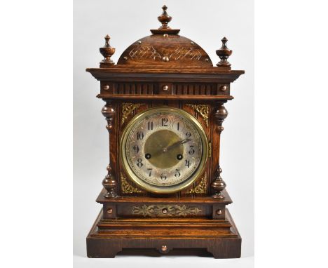 A Late 19th Century Oak Cased Bracket Type Clock with Pierced Brass Mounts and Spandrels, 46cm wide 