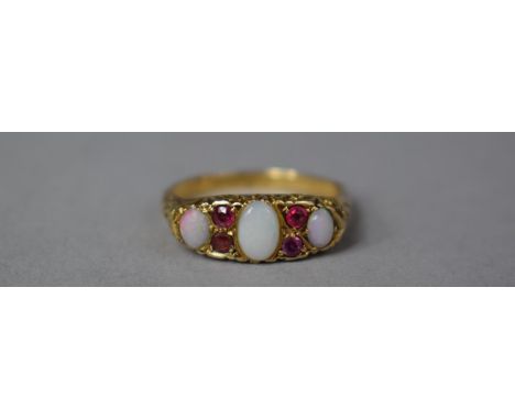 An 18ct Gold Opal and Ruby Boat Ring, Chester Hallmark, Shank AF, Size P 