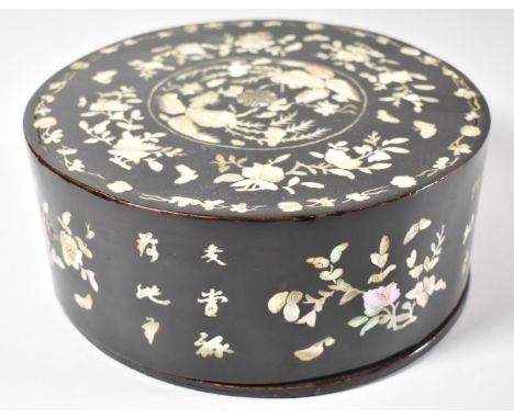 A Japanese Late Edo/Early Meiji Period Circular Lacquer Box and Cover with Mother of Pearl Inlaid Decoration Depicting Charac