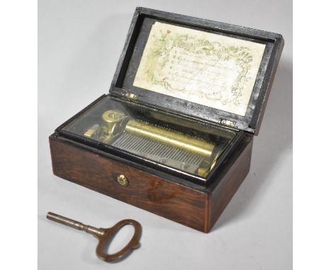 A Small French Rosewood Musical Box with 8cm Barrel Playing Six Airs entitled on Inner Paper Label, with Key and Working, 15c