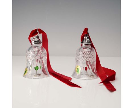 A pair of limited edition Waterford crystal bell ornaments from the celebrated 12 Days of Christmas Collection, representing 