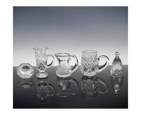 This elegant 5-piece group of Waterford crystal tableware includes a variety of finely cut forms showcasing the brand's signa