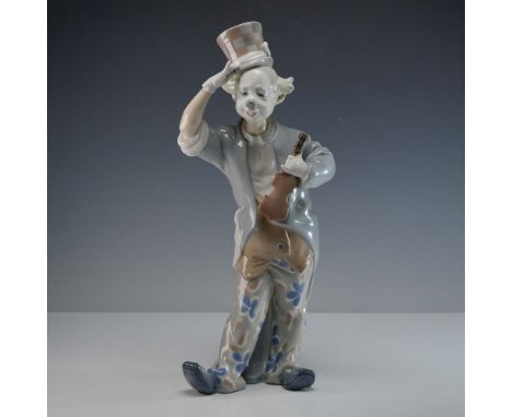 This playful piece depicts a cheerful clown tipping his hat while holding a violin, dressed in a charmingly detailed outfit w