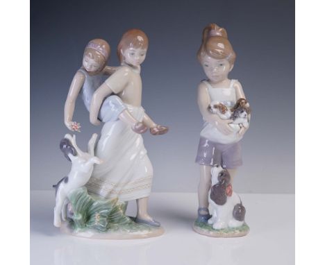 This charming 2-piece set of glossy Lladro porcelain figurines features heartwarming scenes of childhood. Oh Happy Days (0100