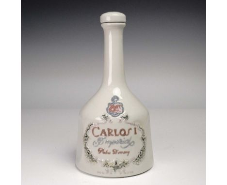 Unopened Carlos I Imperial Gran Reserva brandy bottled in a Lladro porcelain decanter. Comes in a lined blue velvet fitted se