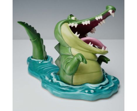This lively Walt Disney Classics Collection figurine titled Tick-Tock, Tick-Tock captures the whimsical crocodile from Disney