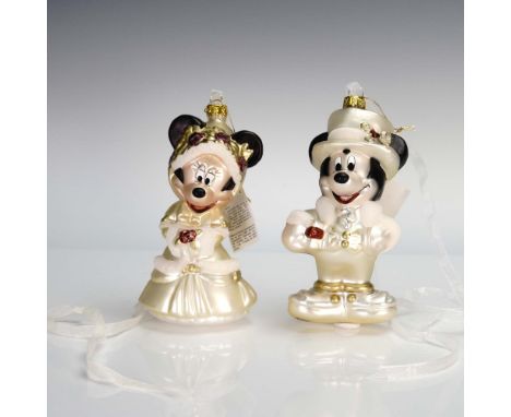 Pair of Walt Disney World collectible Christmas ornaments featuring Mickey Mouse and Minnie Mouse dressed in coordinating for