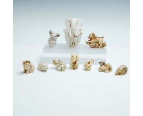 This 10-piece collection of animal figurines is by renowned British sculptor Adam Binder, known for his exquisitely detailed 