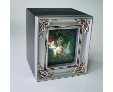 Step into Wonderland with this enchanting Disney Gallery of Light diorama titled A Mad Tea Party, designed by Robert Olszewsk