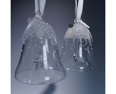 This charming 2-piece Swarovski ornament set includes the 2015 and 2016 editions of the Christmas Bell Ornament, both elegant