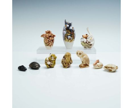 This 10-piece collection of Adam Binder Edition figurines includes three intricately sculpted limited edition animal designs 