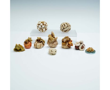 A vibrant 10 piece group of resin animal figurines, showcasing a variety of whimsical creatures in dynamic poses. The centerp