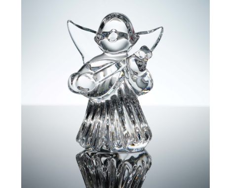 This Baccarat crystal angel figurine is finely crafted in brilliant clear crystal and features a serene angel playing a mando
