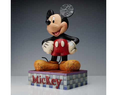 A vibrant and cheerful Mickey Mouse sculpture from the Disney Traditions Showcase Collection, designed by Jim Shore. Titled B