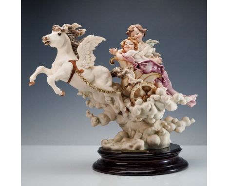 This dramatic limited edition porcelain figurine by Giuseppe Armani, titled Sky Riders, showcases two winged cherubs guiding 