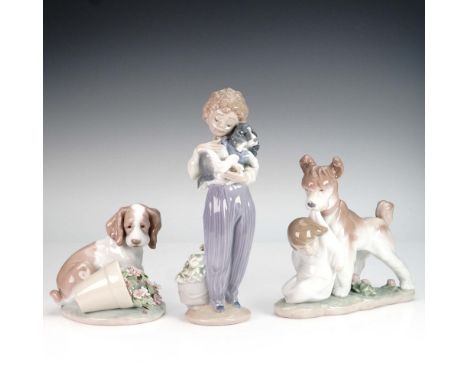 Group of three Lladro porcelain figurines depicting children and their dogs. Includes: My Buddy (01007609), a standing girl i