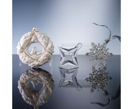 This festive trio of collectible Christmas ornaments features handcrafted and finely detailed work from renowned makers. Incl