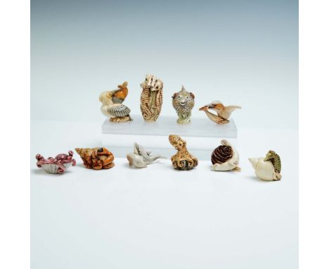A delightful 10-piece collection of sea-themed animal figurines by Adam Binder Editions and Harmony Kingdom, celebrated for t