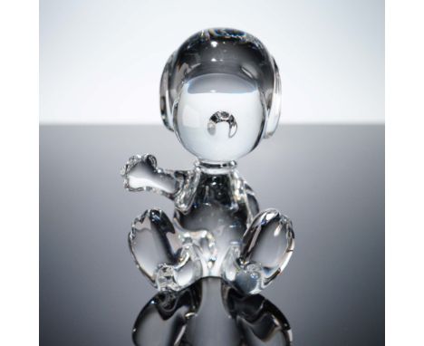 This Baccarat crystal figurine features the beloved Peanuts character Snoopy in a seated pose with a raised paw, masterfully 