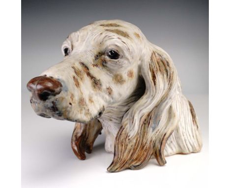 Crafted by the renowned Spanish porcelain manufacturer Lladro, this expressive Setter's Head figurine (1012045) captures the 