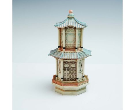 This intricately designed resin sculpture showcases a tiered pagoda structure with exquisite architectural detail. Featuring 
