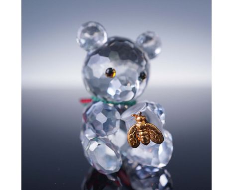 This Swarovski Silver Crystal figurine features the beloved Kris Bear, exquisitely crafted in clear faceted crystal and adorn