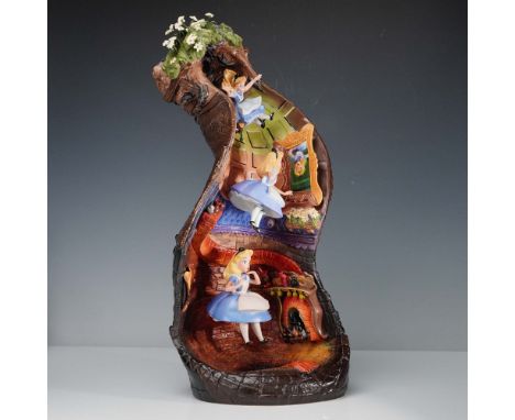 A spectacular 18-inch sculpture from the Walt Disney Classics Collection, titled Down the Rabbit Hole, capturing the whimsica