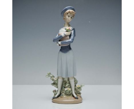 Charming glazed finish figure capturing a tall and graceful young woman wearing a sailor style collared blouse and a light bl