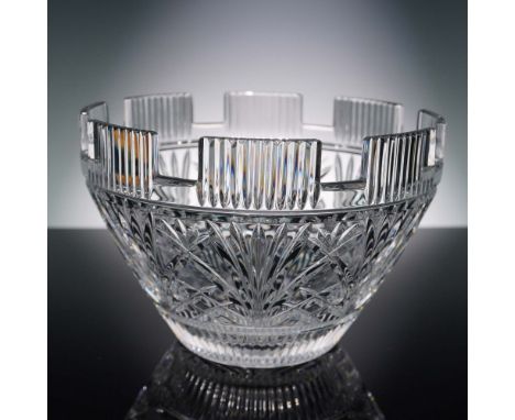 This substantial Waterford clear crystal centerpiece bowl features deeply cut fan, crosshatch, and vertical motifs with a scu