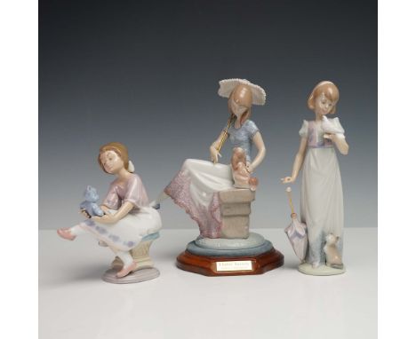 This charming 3-piece set of Lladro porcelain figurines includes: Best Friend (1007620), depicting a young girl tenderly hold