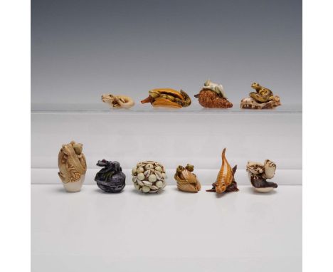 A captivating 10 piece collection of resin animal figurines by Adam Binder Editions, centered around the Special Moments seri