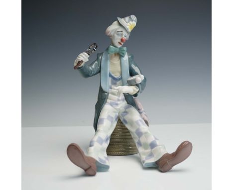 This detailed composition features a playful clown character in pastel harlequin trousers and a long teal coat, seated on a c