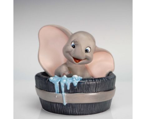 Walt Disney Classics Collection hand-painted porcelain figurine, featuring Dumbo in a wooden-style tub with blue suds spillin