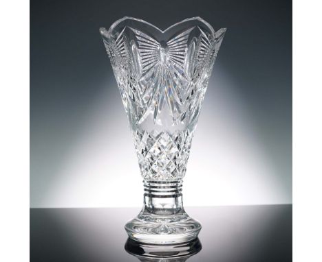 Stunning crystal vase stands featuring a striking flared silhouette with a gently scalloped rim that draws the eye, adorned w