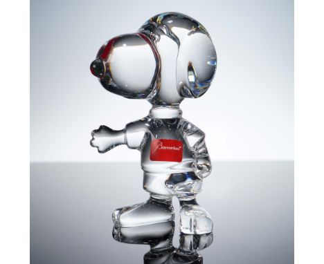 This Baccarat crystal figurine features the beloved Peanuts character Snoopy in a charming pose, expertly crafted from clear 