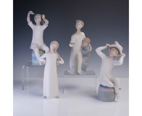 This 4-piece set of Lladro matte-finish porcelain figurines portrays tender scenes of childhood in soft, pastel tones. The gr