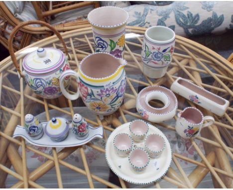 A collection of assorted Poole pottery 