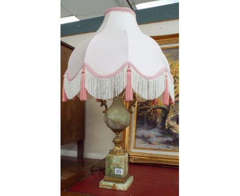 An onyx table lamp with gilt metal mounts and pink shade  